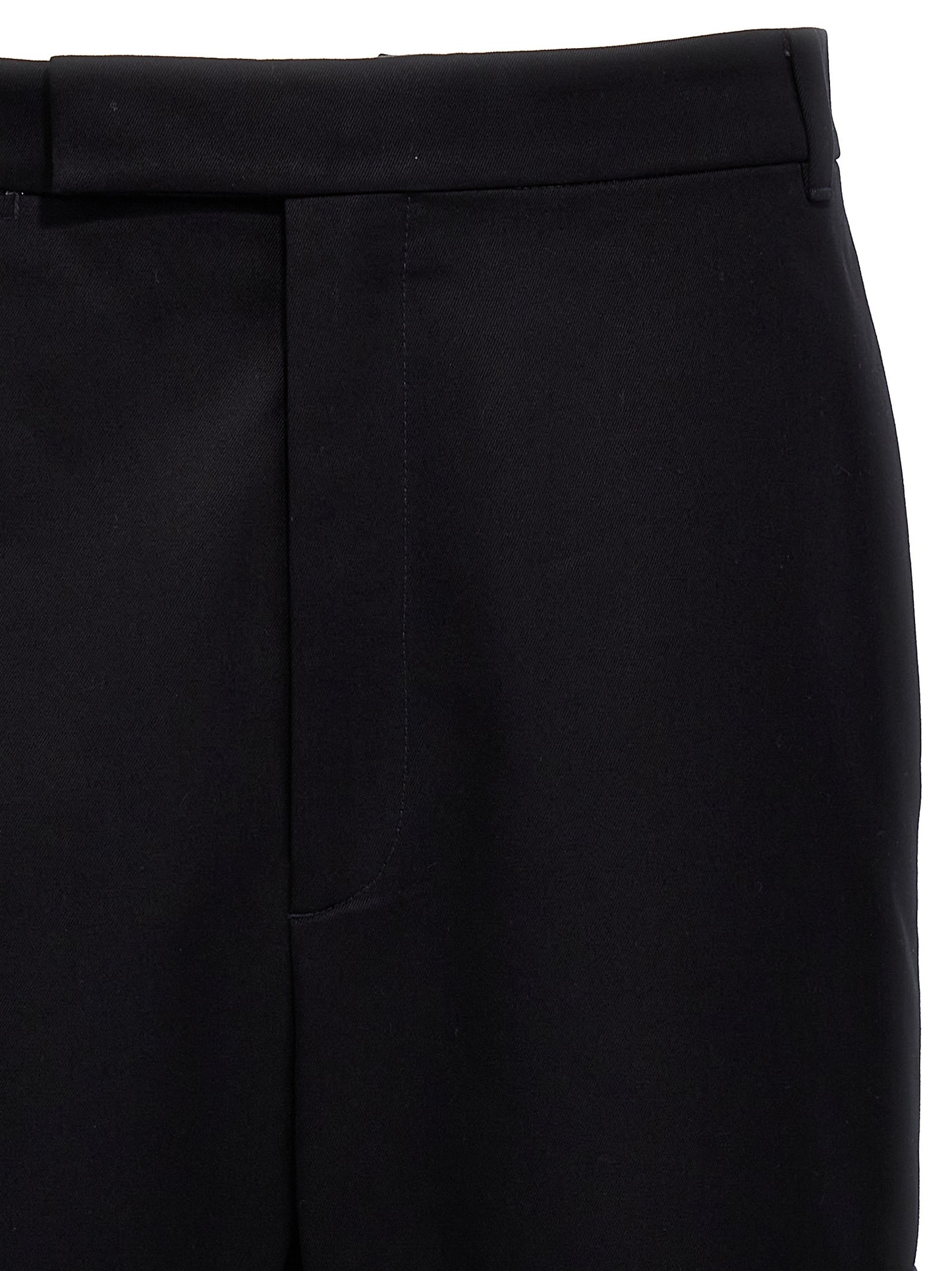 Casual Pants by Thom Browne for men in cotton blue & patchwork features an sartorial straight-leg and long with a cut for a sartorial finish.