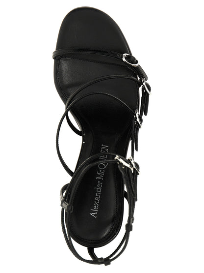 High-Heel Stiletto Sandals by Alexander McQueen for women in lambskin leather and black presents a captivating silhouette, showcasing the signature style of the Women's Lambskin Leather High-Heel Stiletto Sandals with a captivating stiletto high-heel and captivating .
