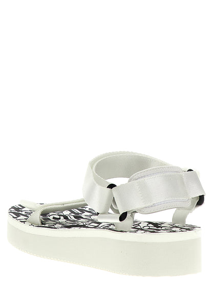 Flat Sandals by Palm Angels for women in polyester & rubber bicolour, black, white & print features an effortlessly chic silhouette from the City Women's Polyester & Rubber Flat Sandals collection, showcasing a effortlessly chic flat and elegant .