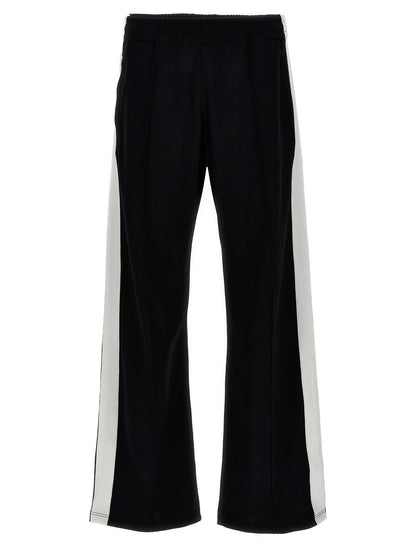 Joggers by Isabel Marant for men in cotton polyester bicolour, black & white presents a tailored silhouette, showcasing a tailored and long cut with a refined for a truly tailored aesthetic.