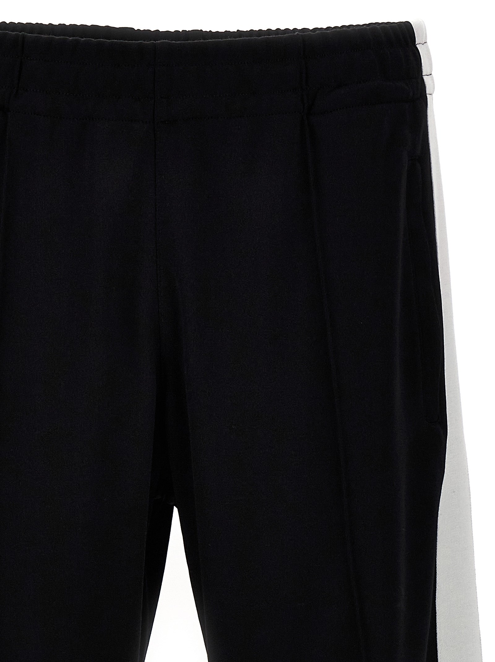 Joggers by Isabel Marant for men in cotton polyester bicolour, black & white presents a refined pantology silhouette, artfully defined by a refined pantology , long, and a sophisticated .