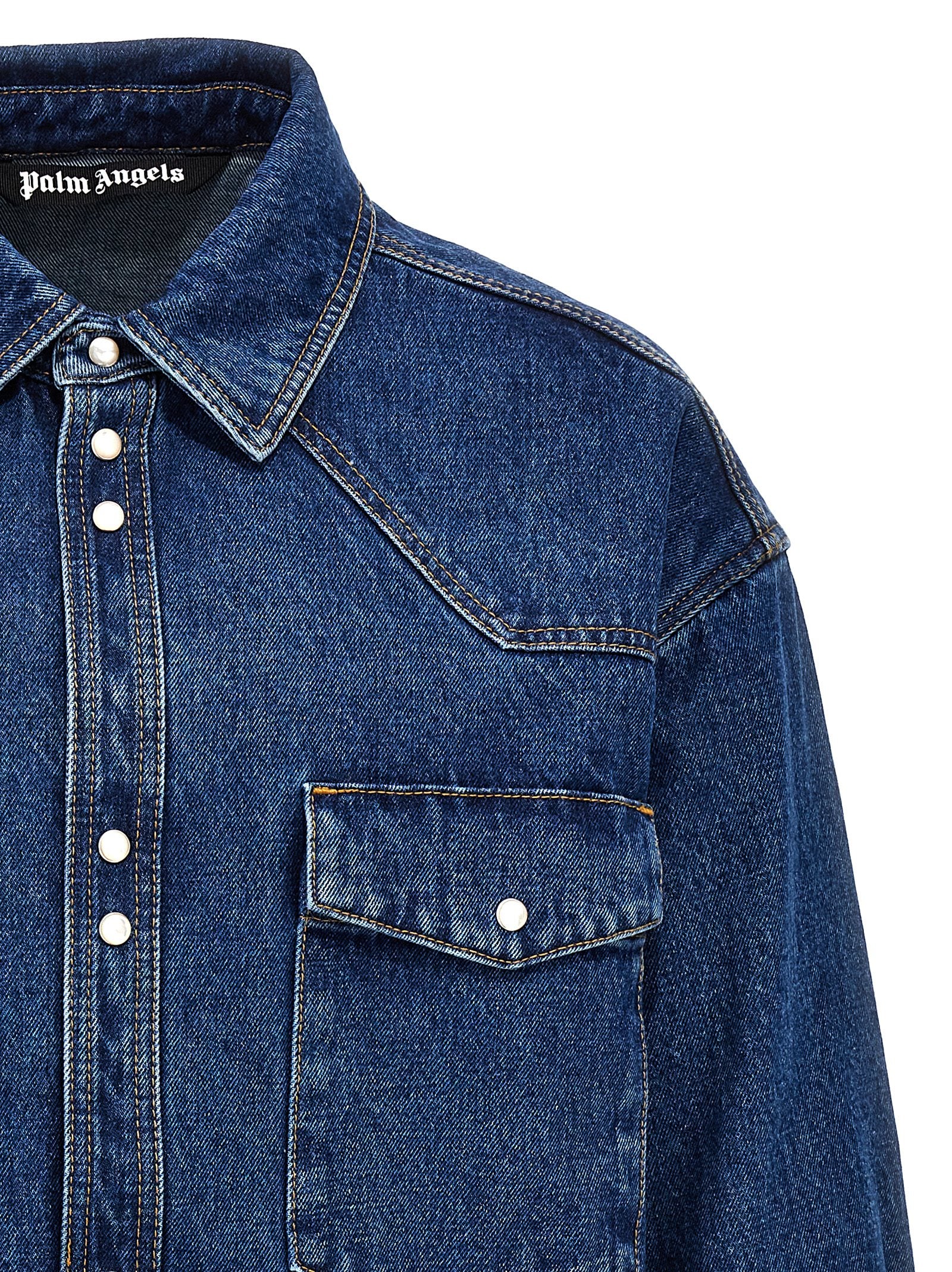 Trucker Jacket by Palm Angels for men in denim cotton blue & monogram features an contemporary silhouette, showcasing a sophisticated and contemporary for a truly refined look.