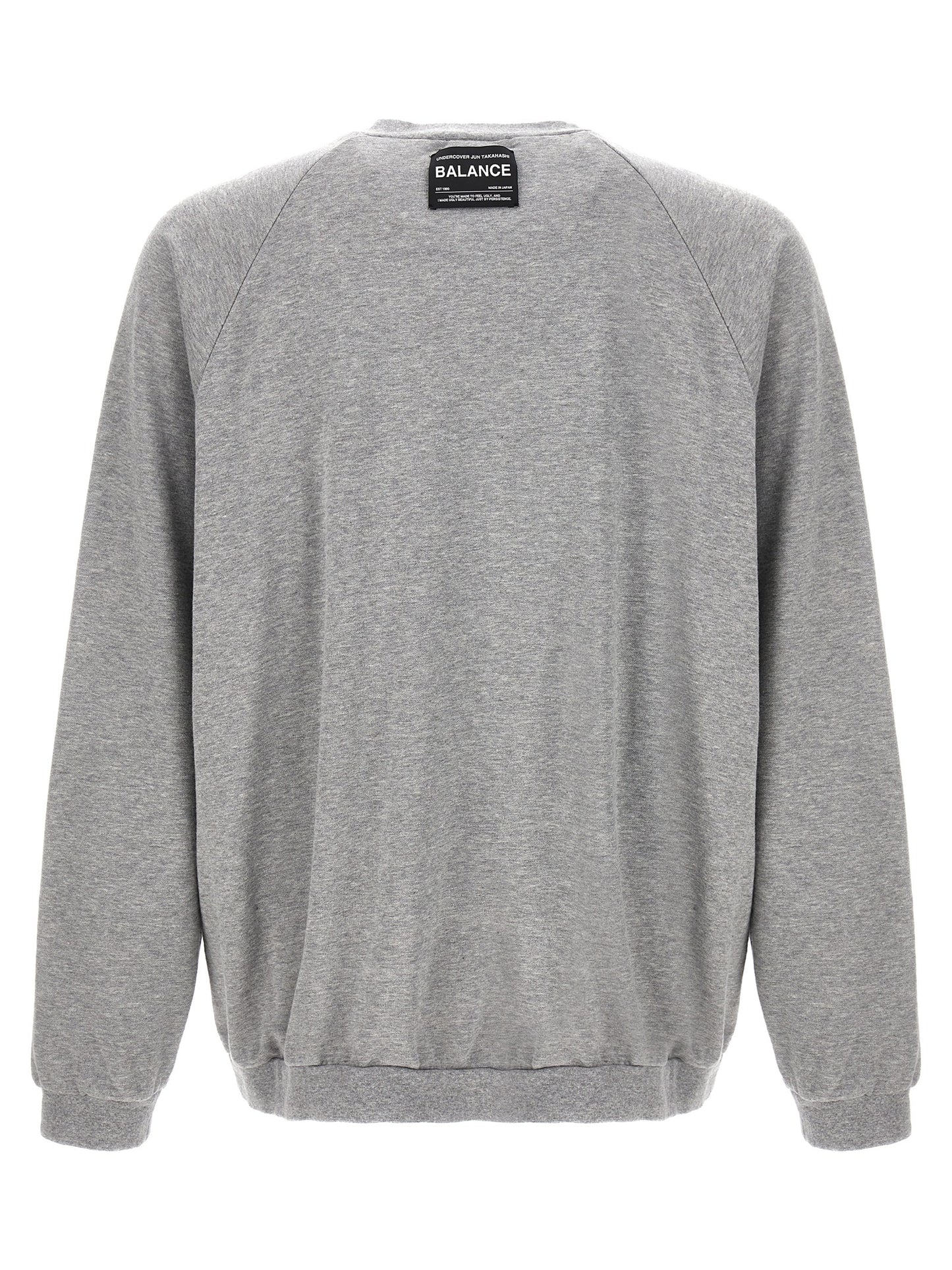 Sweatshirt by Undercover for men in cotton gray & signature features an provocated silhouette, detailed with a provocated and a refined crew neckline for a sophisticated aesthetic.