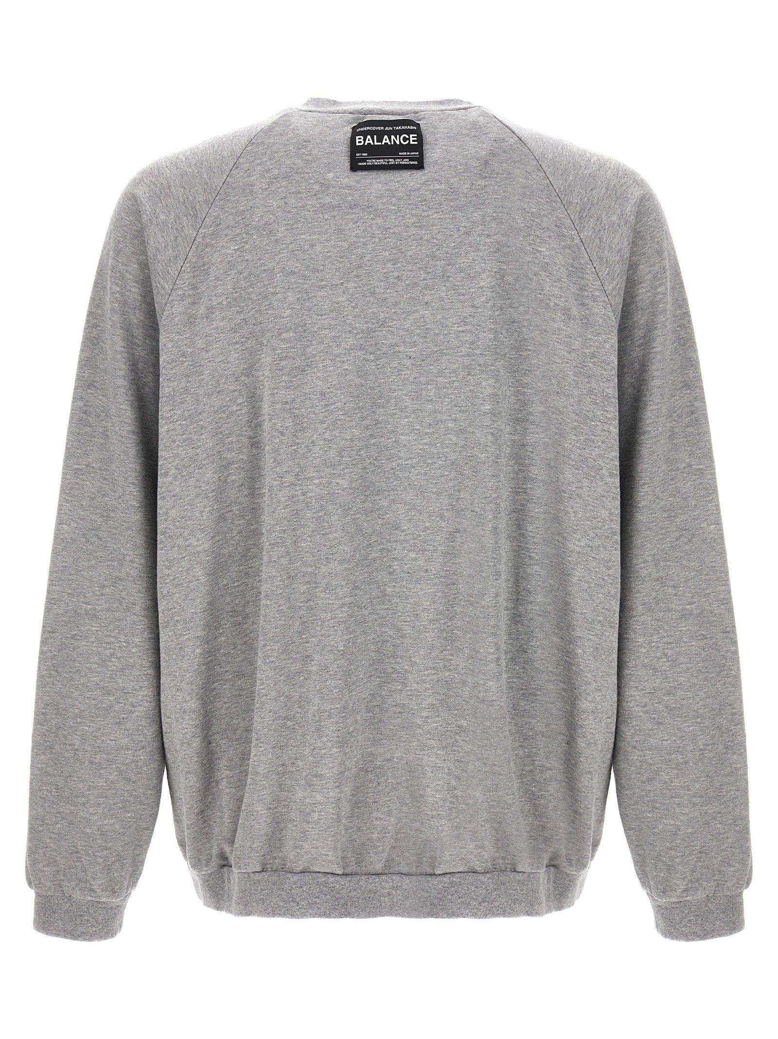 Sweatshirt by Undercover for men in cotton gray & signature features an provocated silhouette, detailed with a provocated and a refined crew neckline for a sophisticated aesthetic.