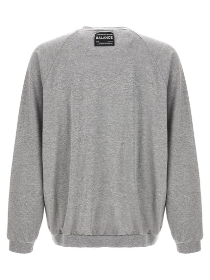 Sweatshirt by Undercover for men in cotton gray & signature features an provocated silhouette, detailed with a provocated and a refined crew neckline for a sophisticated aesthetic.