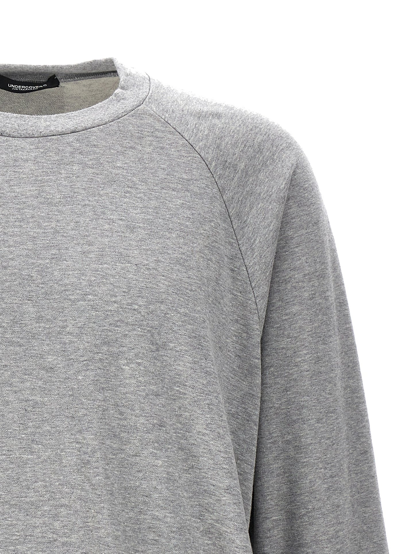 Sweatshirt by Undercover for men in cotton gray & signature features a unrivaled silhouette with a refined crew neckline and unrivaled detailing for a sophisticated look.
