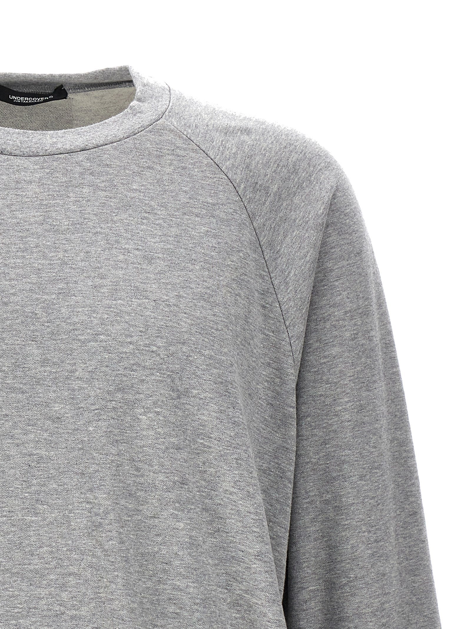 Sweatshirt by Undercover for men in cotton gray & signature features a unrivaled silhouette with a refined crew neckline and unrivaled detailing for a sophisticated look.