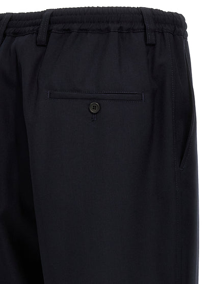 Trousers by Marni for men in virgin wool blue features a sculptural silhouette, showcasing a sculptural cropped and cropped with a sophisticated for a sculptural finish.