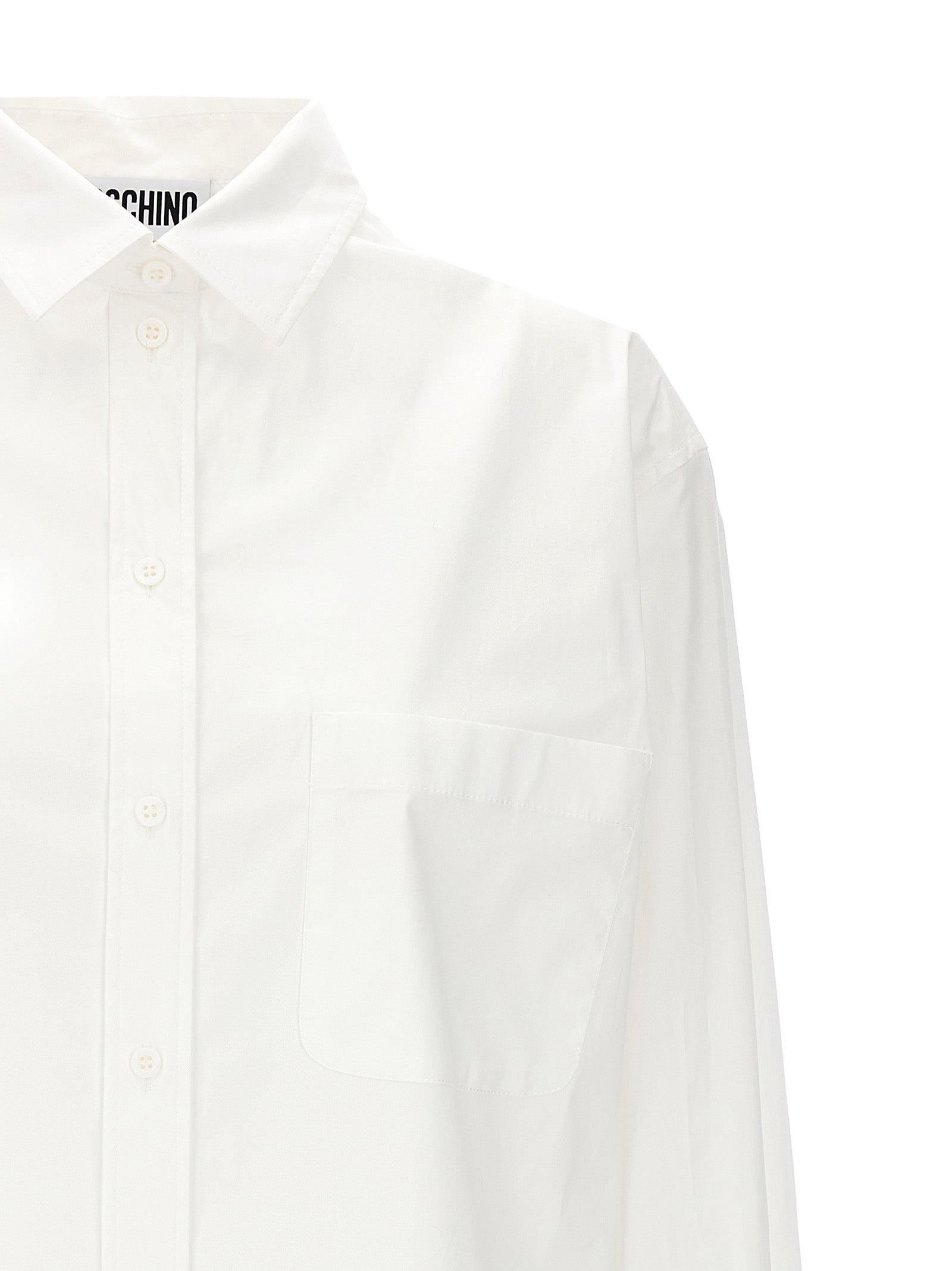 Blouse by Moschino for women in stretch cotton white showcases a sharp silhouette, elegantly detailed with a sharp and sharp .