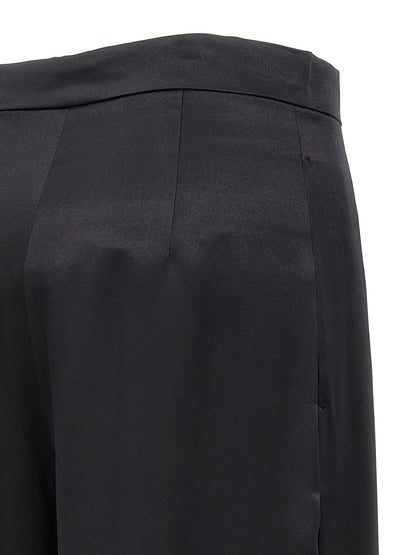 Casual Pants by Max Mara for women in silk black features an sophisticated and with a precise long, creating a sophisticated and sophisticated silhouette.