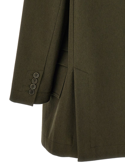 Overcoat by Max Mara for women in cotton bicolour & green showcases a enveloping silhouette, detailed with distinctive pockets and a enveloping .