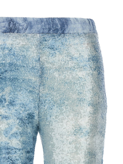 Cargo Pants by LE TWINS for women in polyester & sequins light-blue, camouflage & print features an urban chic with a and long, creating a urban chic aesthetic for "Moon Behind the Hill".