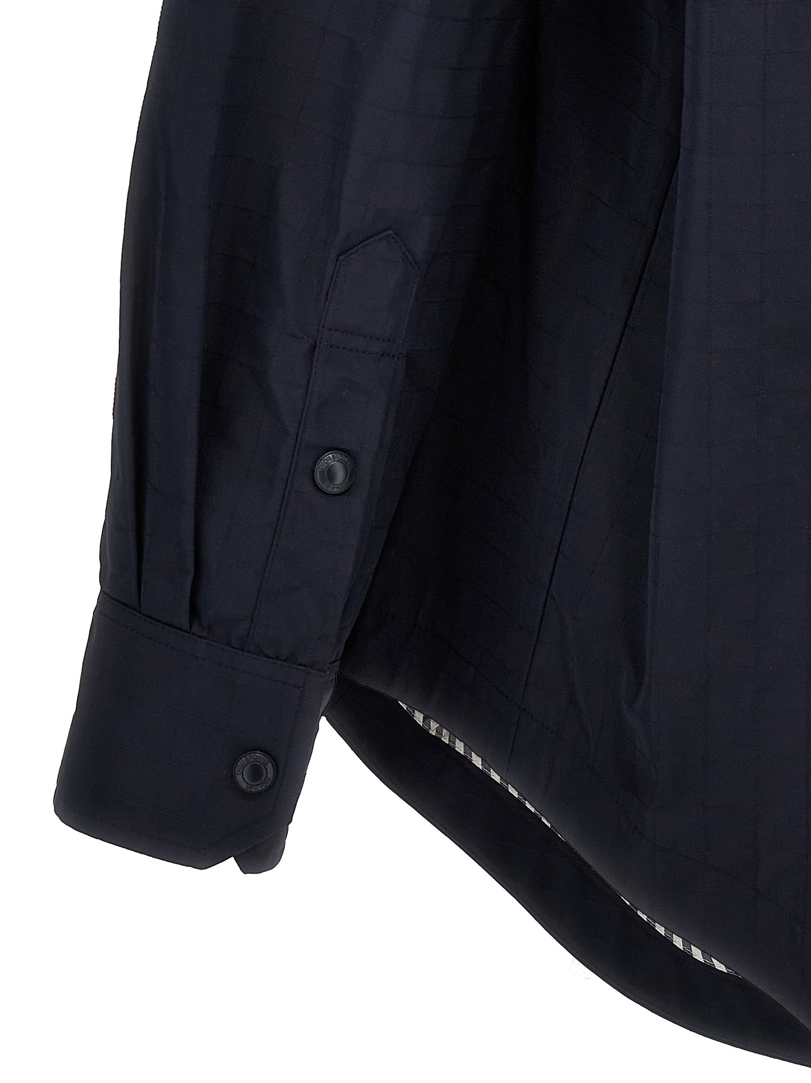 Overshirt by Thom Browne for men in polyamide polyurethane & nylon blue presents a discerning silhouette, showcasing a sophisticated and for a truly discerning finish.