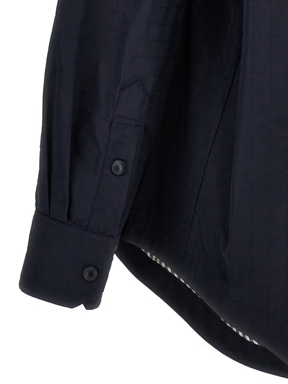 Overshirt by Thom Browne for men in polyamide polyurethane & nylon blue presents a discerning silhouette, showcasing a sophisticated and for a truly discerning finish.