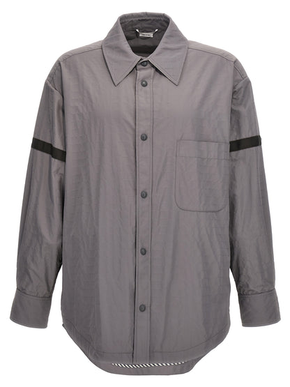 Overshirt by Thom Browne for men in polyamide polyurethane & nylon gray showcases a sharp silhouette, elegantly detailed with a sharp and sharp .
