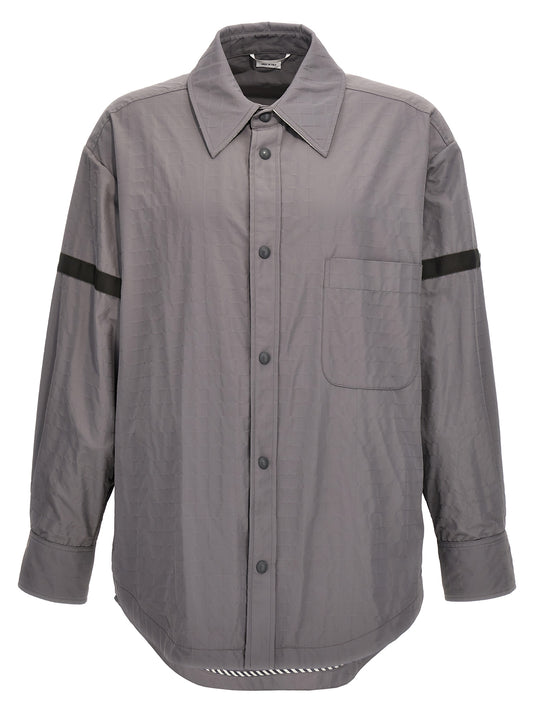 Overshirt by Thom Browne for men in polyamide polyurethane & nylon gray showcases a sharp silhouette, elegantly detailed with a sharp and sharp .