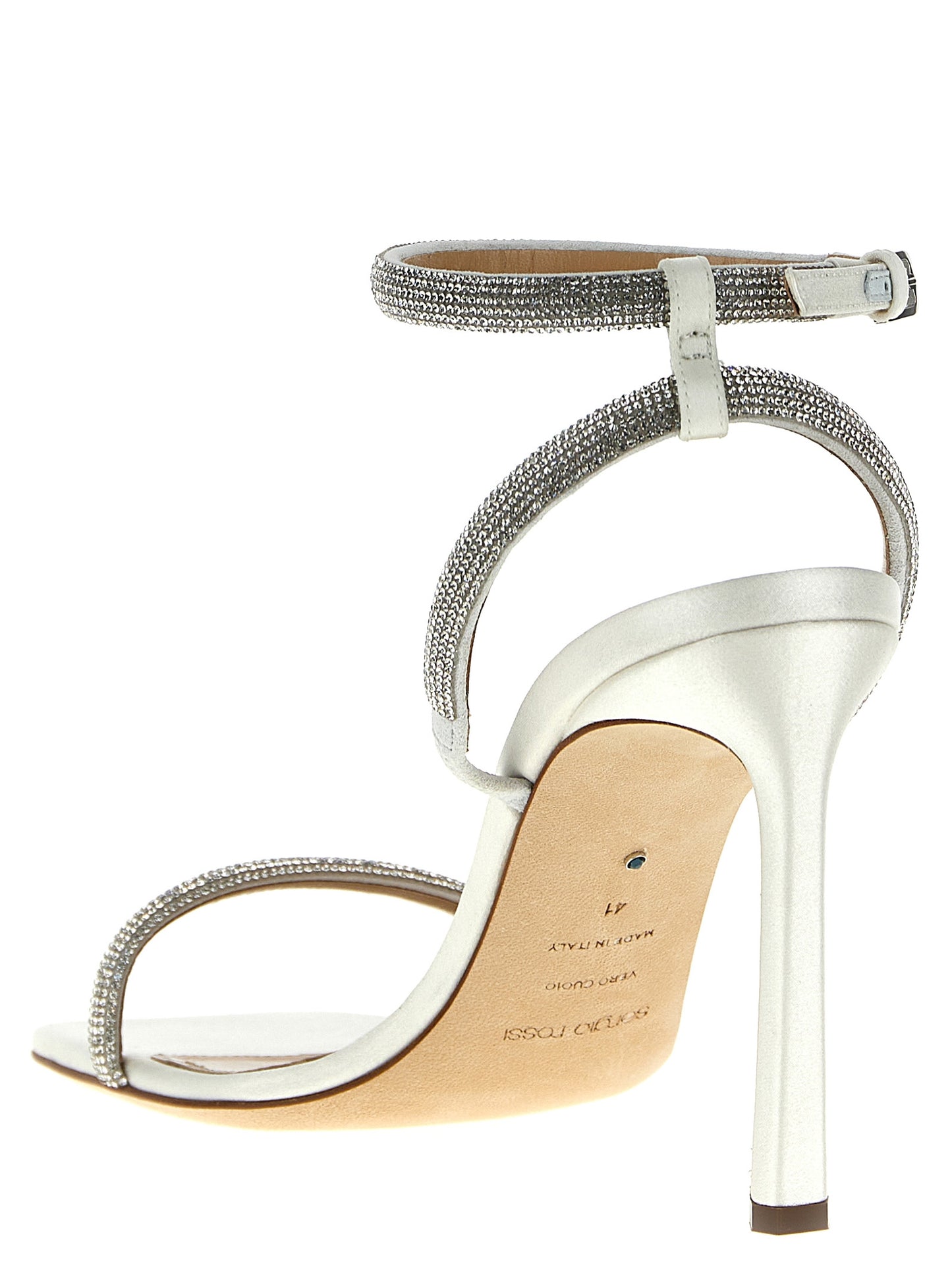 High-Heel Stiletto Ankle Strap Sandals by Sergio Rossi for women in goatskin leather & rhinestone white features an architectural design from the Star Women's Goatskin Leather & Rhinestone High-Heel Stiletto Ankle Strap Sandals collection, defined by a architectural stiletto high-heel and for a architectural finish.