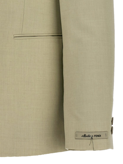 Blazer by Fendi for men in virgin wool beige presents a distinguished silhouette, detailed with a distinguished and distinctive for a truly sophisticated finish.