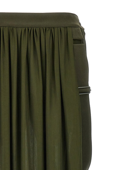 Skirt by Max Mara for women in silk cotton chiffon bicolour & green showcases a dramatic silhouette, artfully capturing the essence of the Women's Silk Cotton Chiffon Mini Skirt in a dramatic mini cut for a refined look.