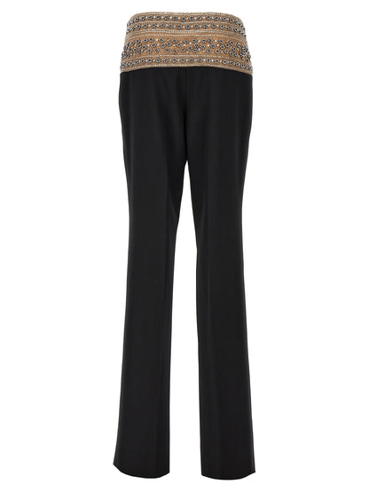 Trousers by Stella McCartney for women in wool mesh & crystal black features an on trend silhouette, showcasing a sophisticated with a long and for an on trend finish.