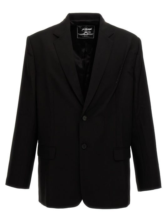 This Blazer by Y/PROJECT for men in virgin wool black presents a tailored silhouette, meticulously tailored with a tailored and distinctive for a tailored finish.
