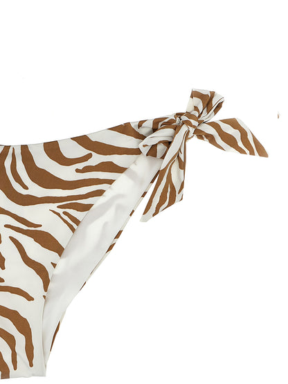 Bikini by Max Mara for women in stretch polyamide animal, beige, zebra & print features an riviera chic silhouette that beautifully encapsulates the signature aesthetic of the Women's Stretch Polyamide Bikini.