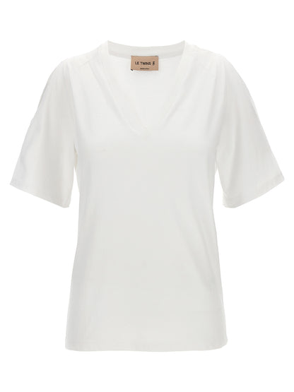 T-Shirt by LE TWINS for women in cotton white showcases a unassuming silhouette, artfully detailed with a refined v-neck neckline and unassuming short-sleeve for a sophisticated, contemporary look.