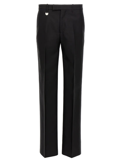 Trousers by Burberry for men in virgin wool & silk black presents a smart silhouette, meticulously detailed with a smart , a smart long, and a smart .