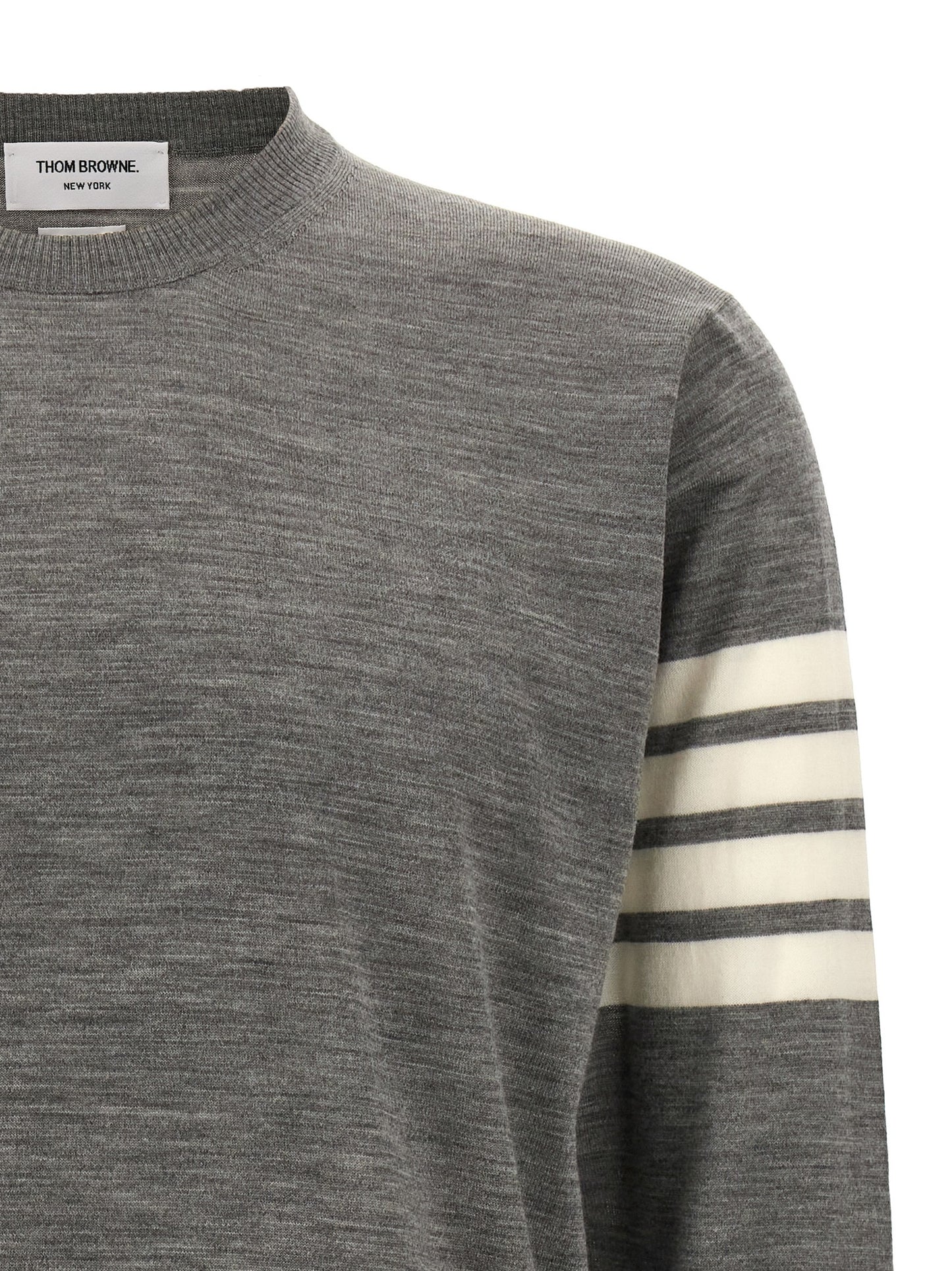 Cardigan by Thom Browne for men in virgin wool gray features a nuanced silhouette with a refined crew neckline and nuanced detailing for a sophisticated look.