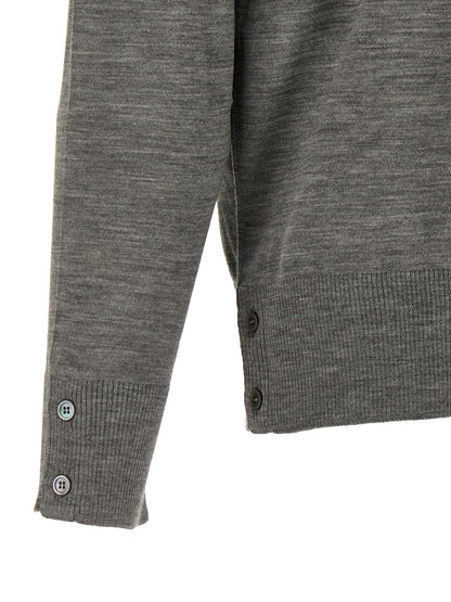 Cardigan by Thom Browne for men in virgin wool gray features a dramatic silhouette, showcasing a sophisticated and dramatic detail for a timeless, premium look.