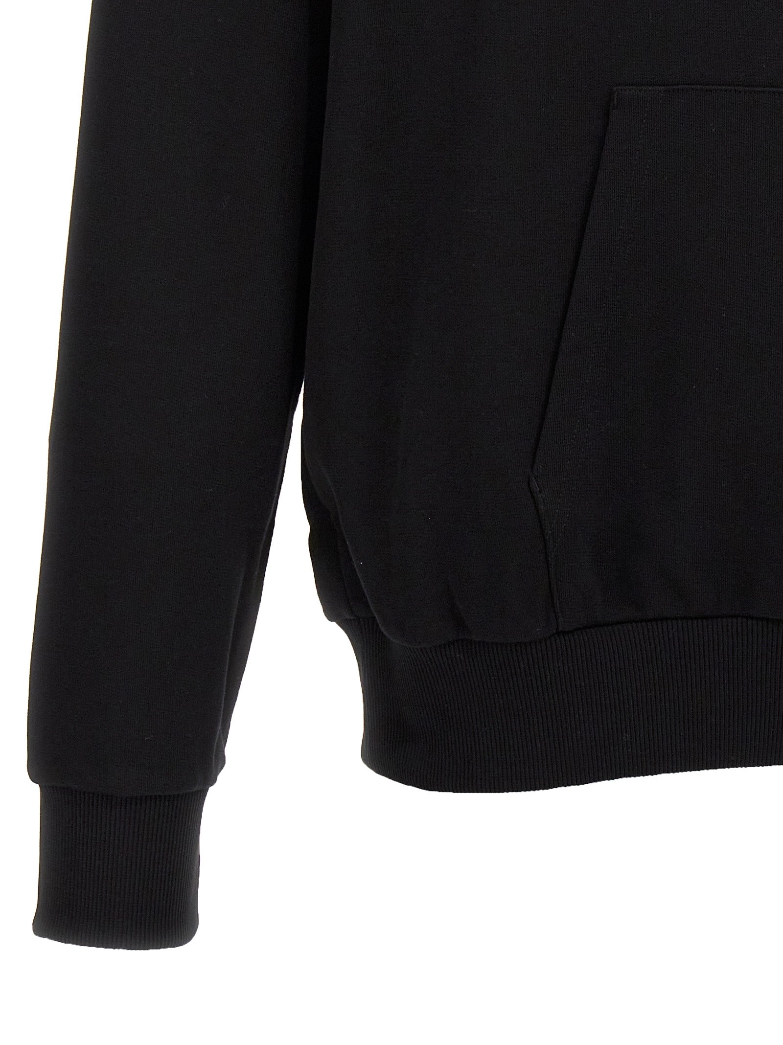 Sweatshirt Hoodie by Balmain for men in organic cotton bicolour, black, white & print features an dramatic silhouette, showcasing a sophisticated and dramatic for a refined, modern aesthetic.