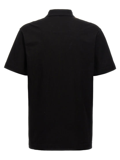 This Polo Shirt by Givenchy for men in cotton black presents a flawless silhouette, showcasing flawless detailing and a refined for a truly flawless aesthetic.