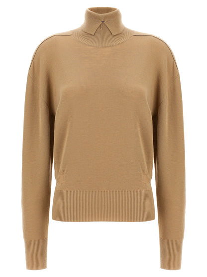 Cardigan by Burberry for women in wool beige features an impeccable silhouette, showcasing a sophisticated split high-neck neckline and long-sleeve detail for a truly impeccable finish.