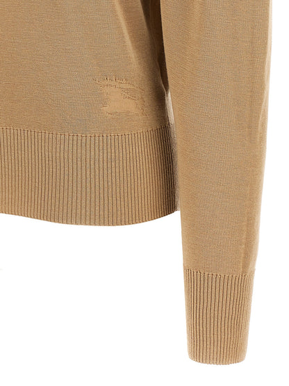 Cardigan by Burberry for women in wool beige presents a textural silhouette, artfully finished with a textural and for a sophisticated, textural look.