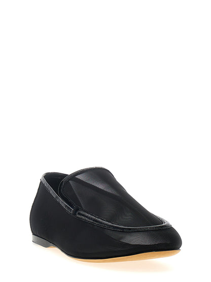 Flat Loafer Slip-On Shoes by Khaite for women in polyamide patent leather black showcases a timeless silhouette from the Women's Polyamide Patent Leather Flat Loafer Slip-On Shoes collection, featuring a timeless flat and for a timeless finish.