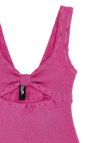 One-Piece Swimsuit by ROTATE BIRGER CHRISTENSEN for women in stretch polyamide fuchsia features an jaw dropping silhouette, showcasing the jaw dropping Waves Women's Stretch Polyamide One-Piece Swimsuit design with a sophisticated cut for a jaw dropping finish.