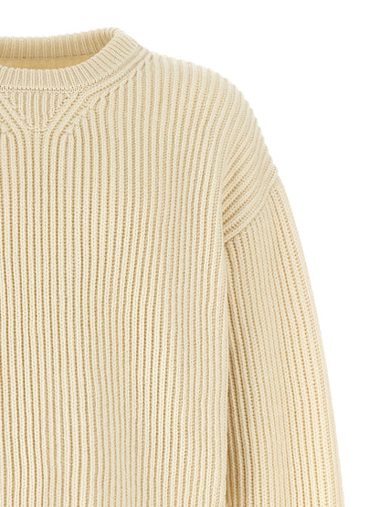 Cardigan by Jil Sander for men in wool white showcases a luxurious silhouette, meticulously detailed with a sophisticated and for a refined finish.