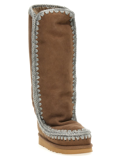 Ankle Over-The-Knee Boots by Mou for women in suede lamb leather & fur brown features an enchanting design from the Women's Suede Lamb Leather & Fur Ankle Over-The-Knee Boots collection, highlighting a enchanting and for a refined look.