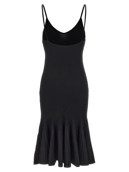 Dress by Khaite for women in polyamide polyester viscose black features an sultry silhouette defined by a v-neck neckline and , falling to an sultry midi for a sultry look.
