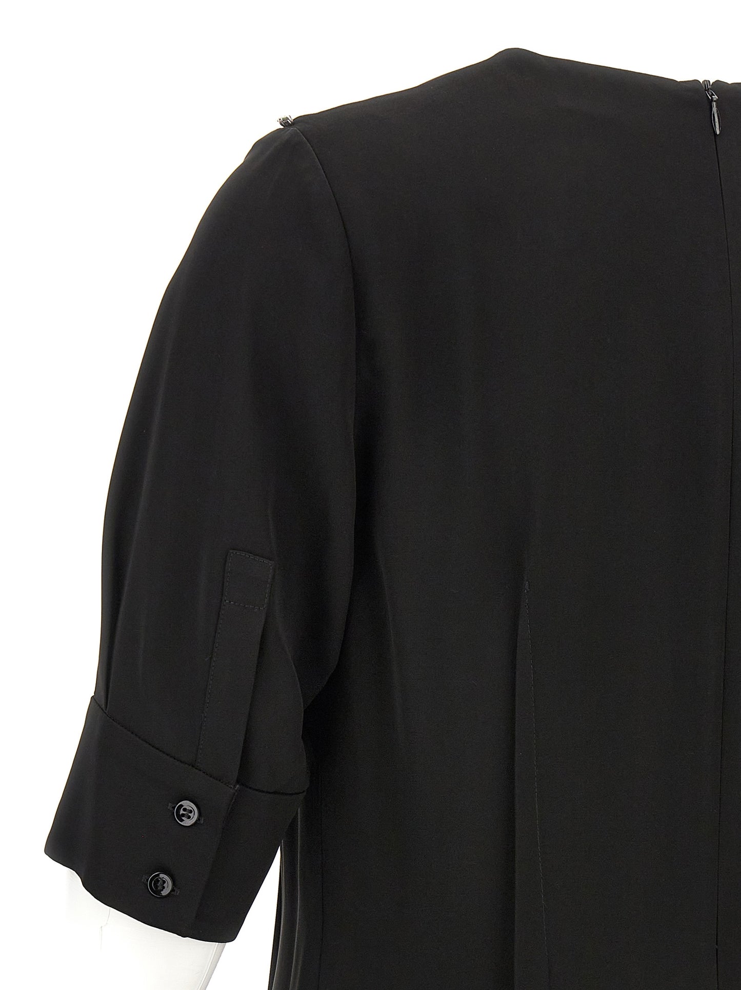 Dress by Sportmax for women in viscose black features an magnificent silhouette, artfully detailed with a magnificent and that flows into an magnificent midi short.