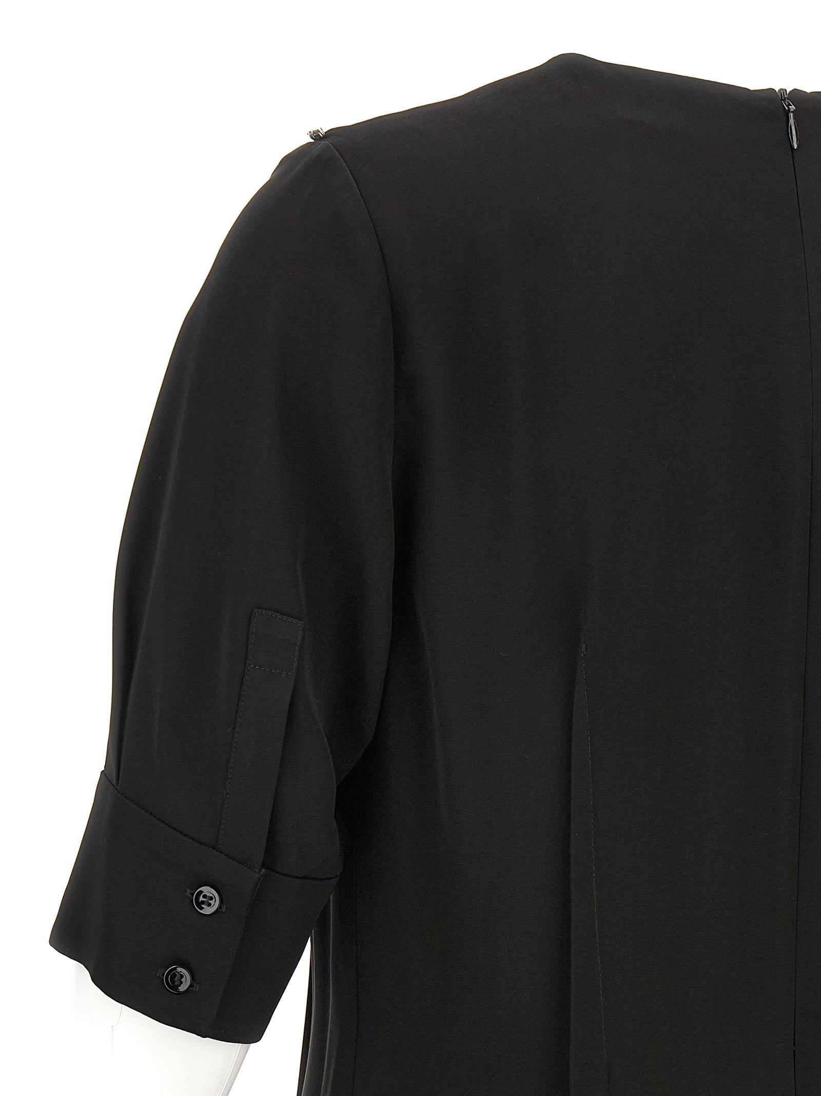Dress by Sportmax for women in viscose black features an magnificent silhouette, artfully detailed with a magnificent and that flows into an magnificent midi short.