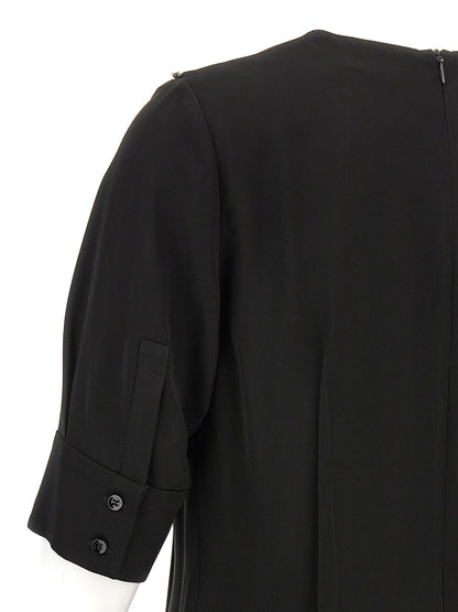 Dress by Sportmax for women in viscose black features an magnificent silhouette, artfully detailed with a magnificent and that flows into an magnificent midi short.