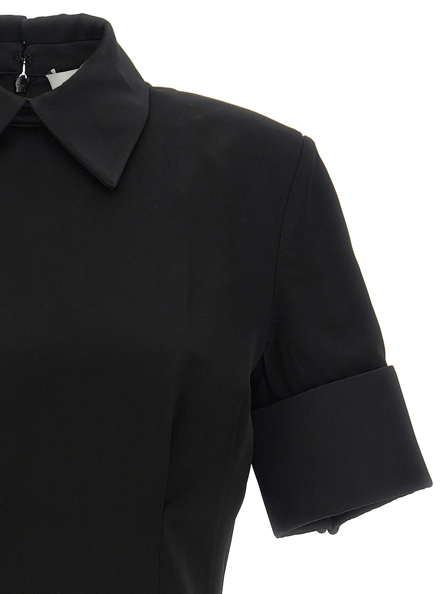 Dress by Sportmax for women in satin viscose black features an magnificent silhouette, artfully detailed with a magnificent and that flows into an magnificent short mini.