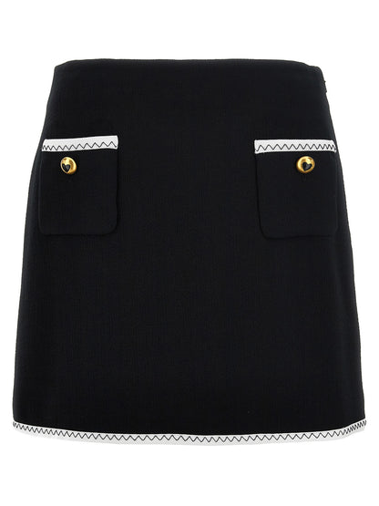 Skirt by Moschino for women in viscose wool crepe bicolour, black & white features an tailored silhouette, artfully capturing the essence of Heart Spin Women's Viscose Wool Crepe Long Skirt in a sophisticated long.
