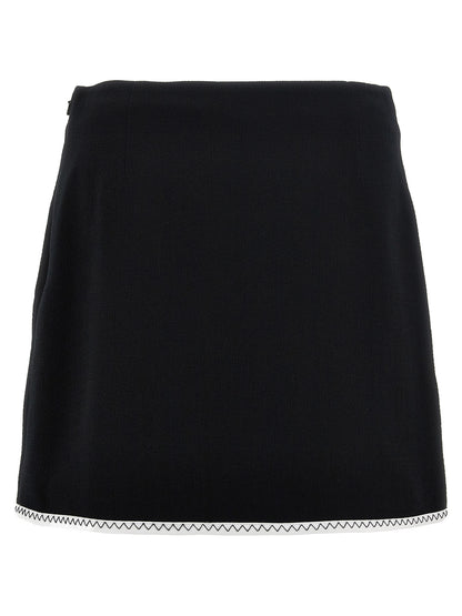 Skirt by Moschino for women in viscose wool crepe bicolour, black & white showcases a dramatic silhouette, artfully capturing the essence of the Heart Spin Women's Viscose Wool Crepe Long Skirt in a dramatic long cut for a refined look.