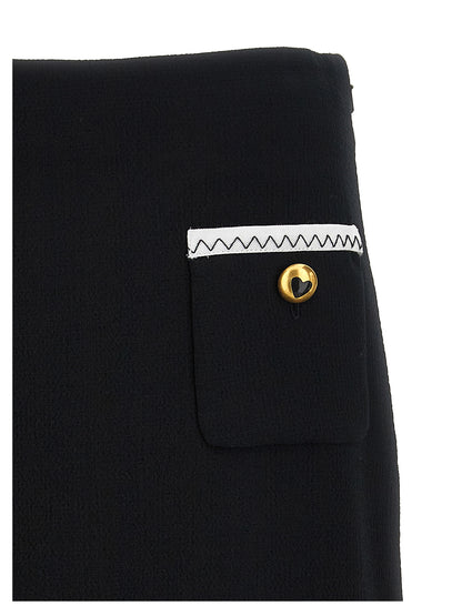 Skirt by Moschino for women in viscose wool crepe bicolour, black & white features an relaxed-yet-refined silhouette that elegantly showcases the Heart Spin Women's Viscose Wool Crepe Long Skirt design and sophisticated long.