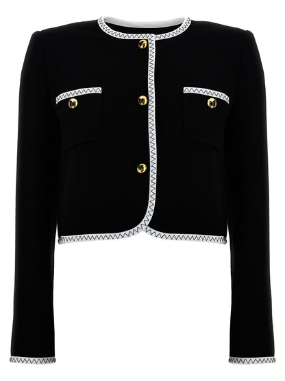 Overcoat by Moschino for women in viscose wool crepe bicolour, black & white features an satoral silhouette, showcasing a sophisticated and satoral pockets & insulated for a premium, timeless look.