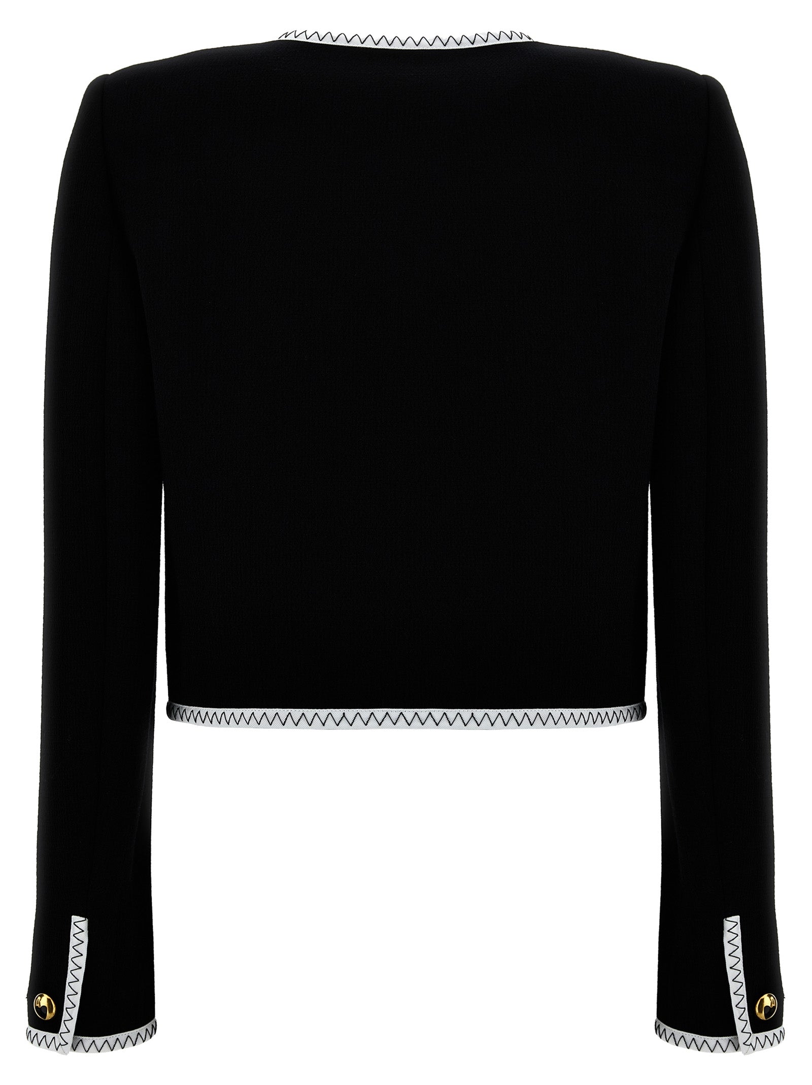 Overcoat by Moschino for women in viscose wool crepe bicolour, black & white features a contemporary silhouette showcasing a contemporary and refined pockets & insulated for a sophisticated finish.