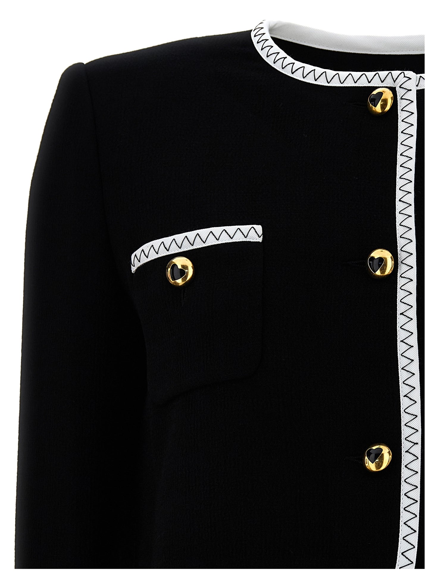Overcoat by Moschino for women in viscose wool crepe bicolour, black & white showcases a enveloping silhouette, detailed with distinctive pockets & insulated and a enveloping .