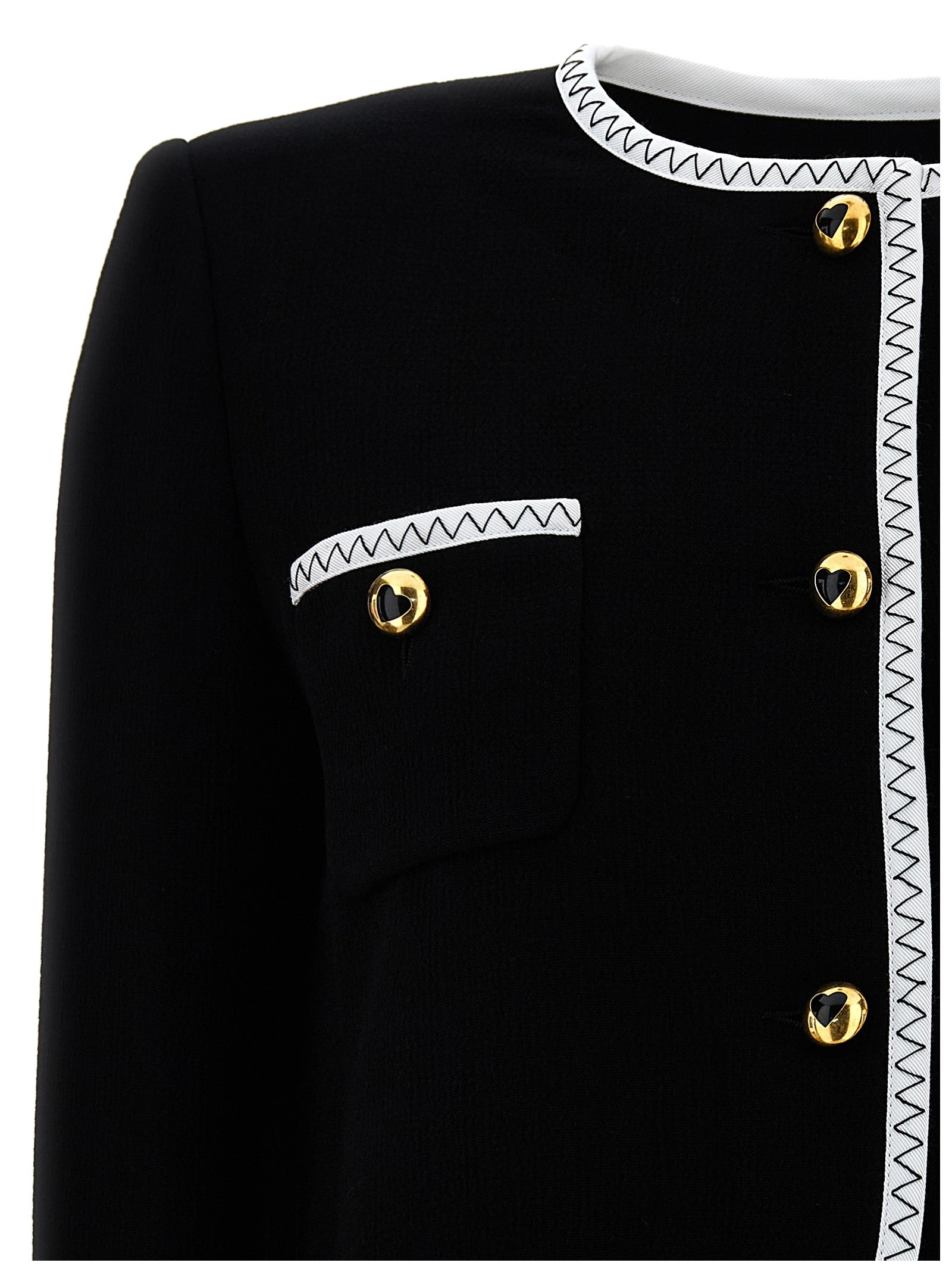 Overcoat by Moschino for women in viscose wool crepe bicolour, black & white showcases a enveloping silhouette, detailed with distinctive pockets & insulated and a enveloping .